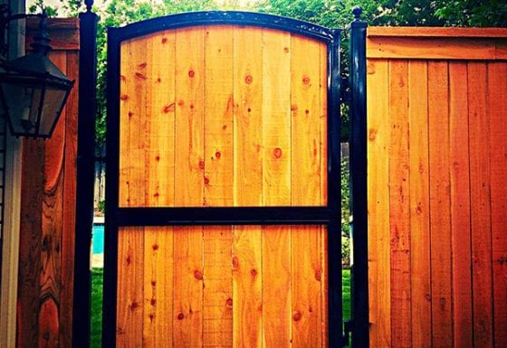 CEDAR FENCE WITH CUSTOM IRON TRIM Gladiator / Wags